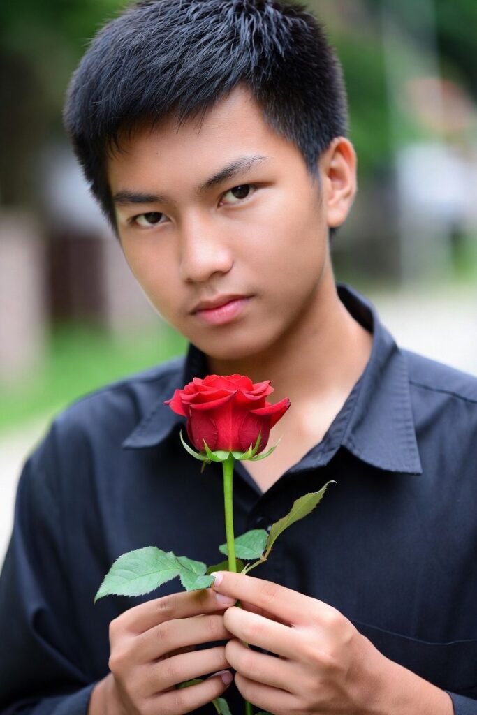 ছেলেদের হাতে গোলাপ ফুলের ছবি